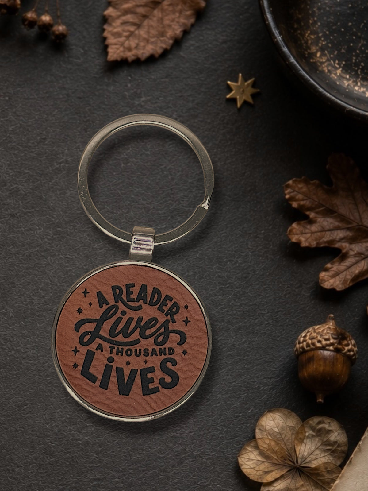 A Reader Lives A Thousand Lives Keychain